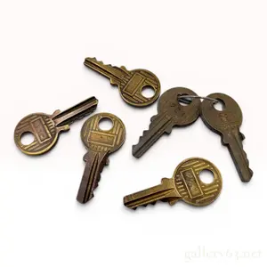 A Collection of Vintage Gold-Tone Hermes Keys