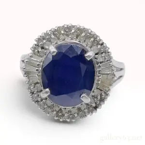 Platinum 3.0 Carat Oval Blue Sapphire and 0.35ctw Diamond Ballerina Halo Ring