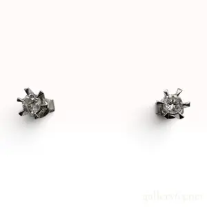 A Pair of Platinum and Diamond Stud Earrings