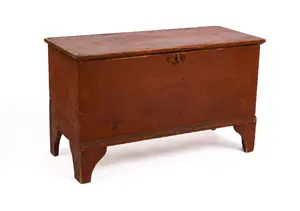 SMALL QUEEN ANNE BLANKET CHEST IN OLD RED PAINT.