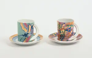 TWO ROSENTHAL ESPRESSO CUPS AND SAUCERS.