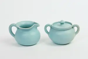 GORDY POTTERY SUGAR BOWL AND CREAMER.