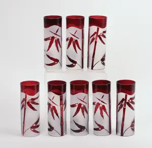 EIGHT MID CENTURY RED AND FROSTED GLASSES.