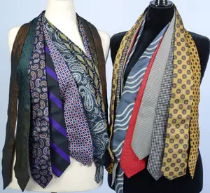 TWELVE DESIGNER TIES.