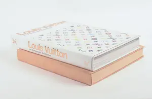 TWO ART BOOKS: THOMAS MCKNIGHT AND LOUIS VUITTON.