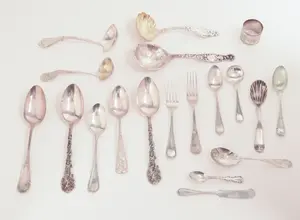 COLLECTION OF STERLING SILVER FLATWARE.