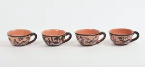 FOUR MEXICAN TLAQUEPAQUE POTTERY CUPS