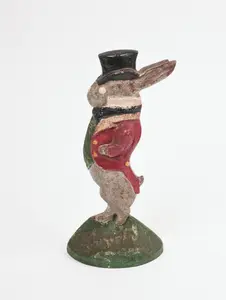 CAST IRON RABBIT IN TOP HAT DOORSTOP.