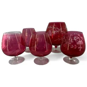 Five Cranberry Glass Stemmed Vessels