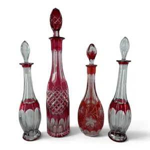 Four Bohemian Cut-to-Clear Decanters