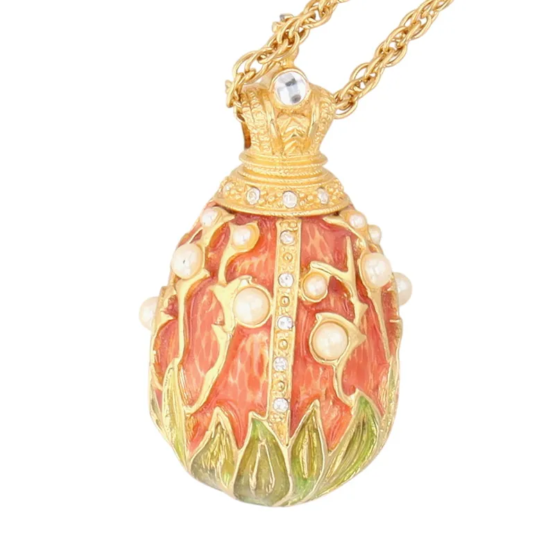 Joan Rivers Gold Tone Enamel Floral Egg Pendant Necklace from auction in Ravenna, Ohio — image 26