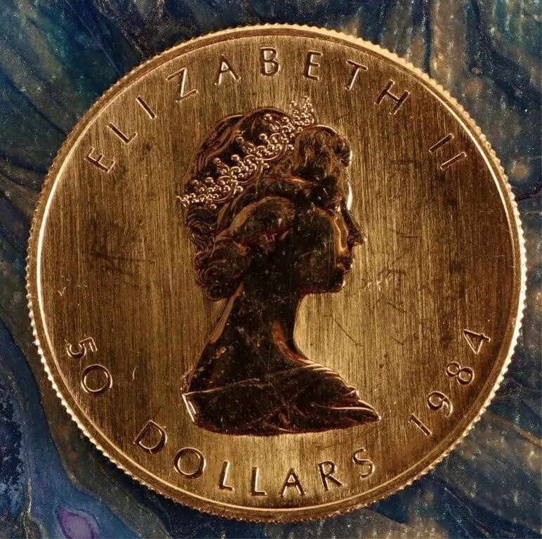 FINE GOLD 1 OZT 1984 $50 CANADIAN MAPLE LEAF MS from auction in Tallahassee, Florida — image 39