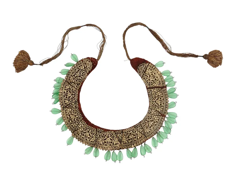 A SOUTH-ASIAN CHASED BRASS CEREMONIAL NECKLACE, 19TH CENTURY from auction in New York, New York — image 16