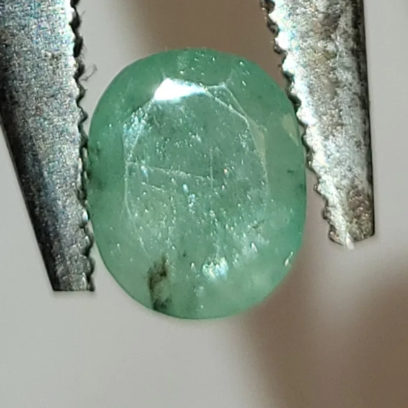 natural light green zambran ? emerald 2 carats from auction in wilmington , North Carolina — image 7