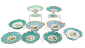Nine Floral-Decorated Porcelain Compotes and Plates