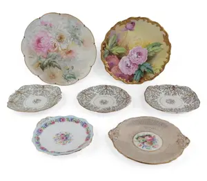 Two Floral Decorated Porcelain Chargers