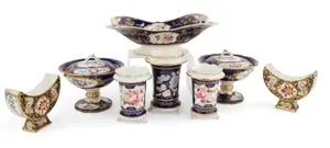 Eight Cobalt and Gilt Porcelain Table Articles