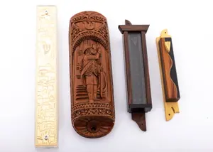 A GROUP OF FOUR MEZUZOT COVERS.