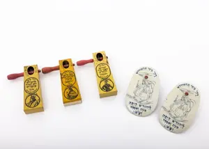A COLLECTION OF FIVE PRINTED TIN GRAGGERS