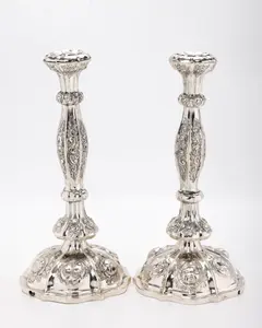 A PAIR OF FANCY SILVER RUSSIAN CANDLESTICKS. 1857