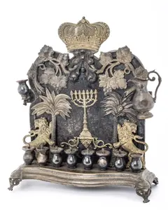 A BRASS HANUKKAH LAMP. Warsaw, c. 1880.