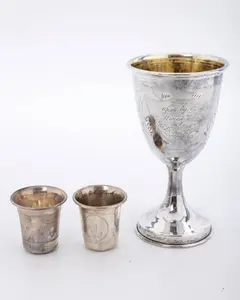 THREE STERLING SILVER KIDDUSH CUPS. American, c. 1900.