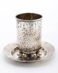 A STERLING SILVER KIDDUSH CUP AND PLATE