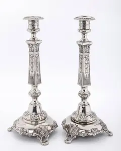 A MASSIVE PAIR OF RUSSIAN SILVER CANDLESTICKS BY JOSEF EHRELICH, Warsaw, c. 1890