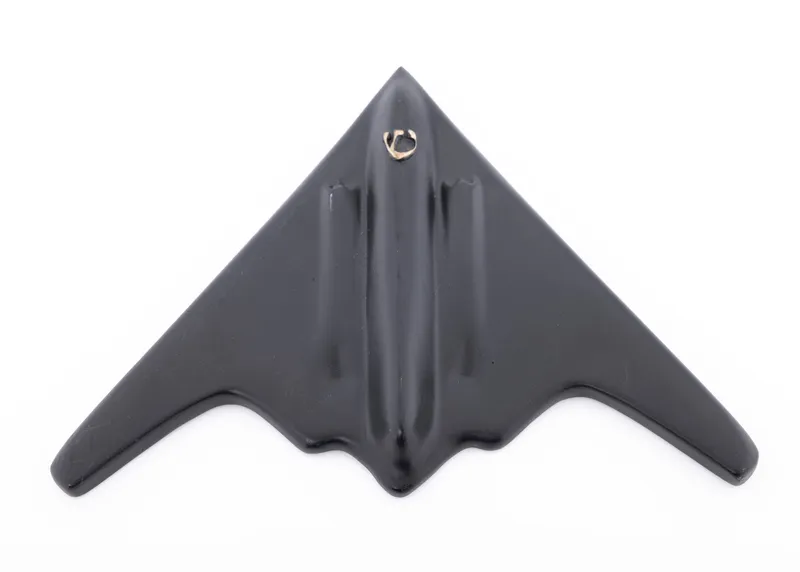 A HEAVY COPPER MEZUZAH IN THE SHAPE OF A B-2 BOMBER. Israel, modern from auction in woodmere, New York — image 11