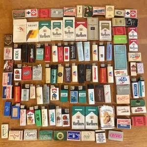 Large Collection of Vintage Tobacco Ephemera Including Cigarette Packs, Lighters, and Matchboxes