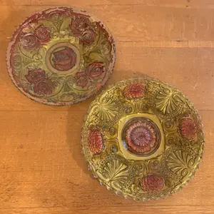 A Pair of Large Goofus Glass Plates with Relief Molded Floral Motifs
