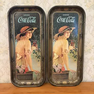 A Pair of Coca-Cola Lithographed Tin Advertising Trays 1972 Reproductions of 1916 World War I Girl Design