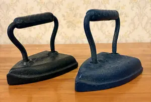 A Pair of Antique Cast Iron Sad Irons
