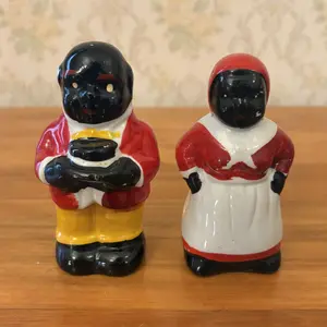 A Pair of Vintage Painted Ceramic Black Americana Salt and Pepper Shakers