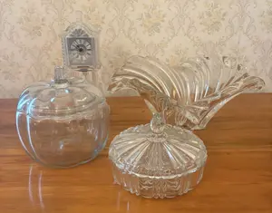 An Assortment of Decorative Glassware and a Crystal Legends Mantle Clock