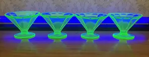 A Set of Four Uranium Depression Glass Paneled Sherbet Cups