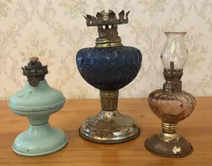 Three Miniature Oil Lamps in Enameled Metal and Glass