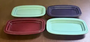 A Set of Four Homer Laughlin Fiesta Ceramic Butter Dish Bases