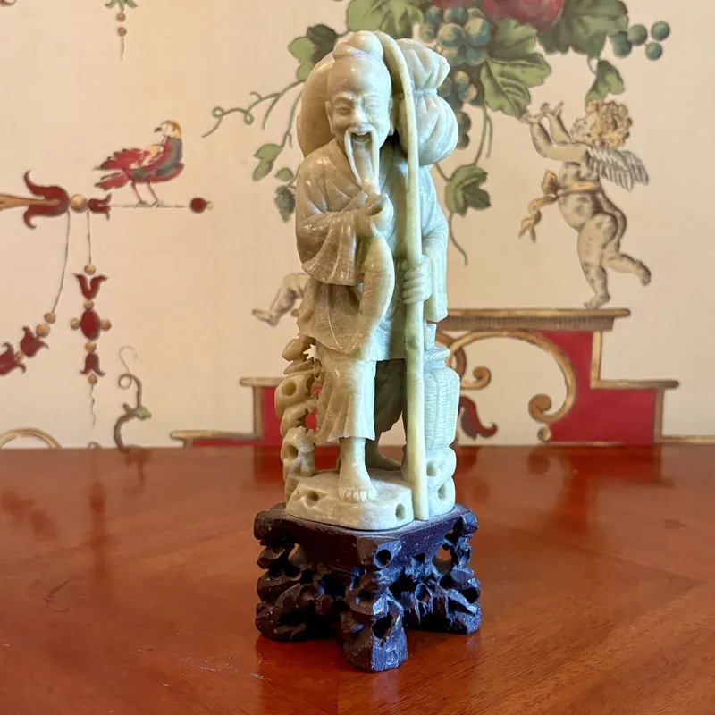 A carved soapstone figure of a fisherman, 20th century from auction in Shelbyville, Kentucky — image 30