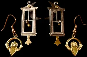 A Pair of Guillotine Motif Mixed-Metal Earrings and a Pair of Claddagh Motif Drop Earrings