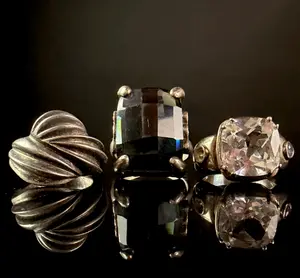 A Trio of Sterling Silver Cocktail Rings including a TOUS Swirl Dome Ring