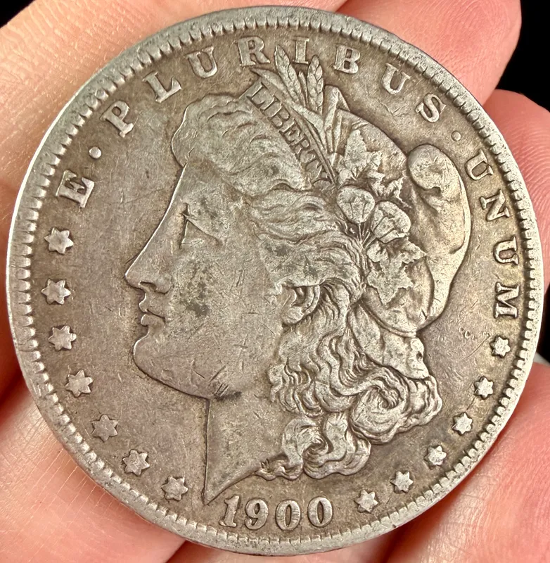 A 1900-O Morgan Silver Dollar from auction in Campbell, New York — image 29