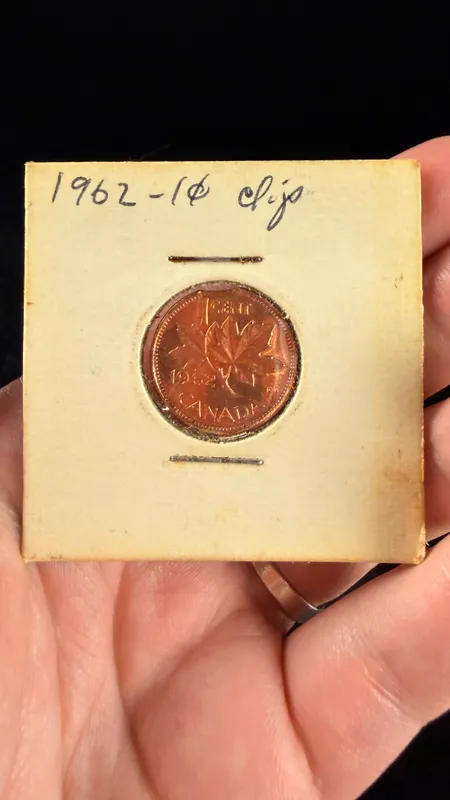 Canada 1962 1 Cent Mint Error Curved Planchet Clip from auction in Campbell, New York — image 35