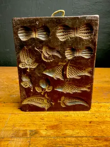 Vintage Carved Wax Culinary Mold with Animal and Botanical Motifs