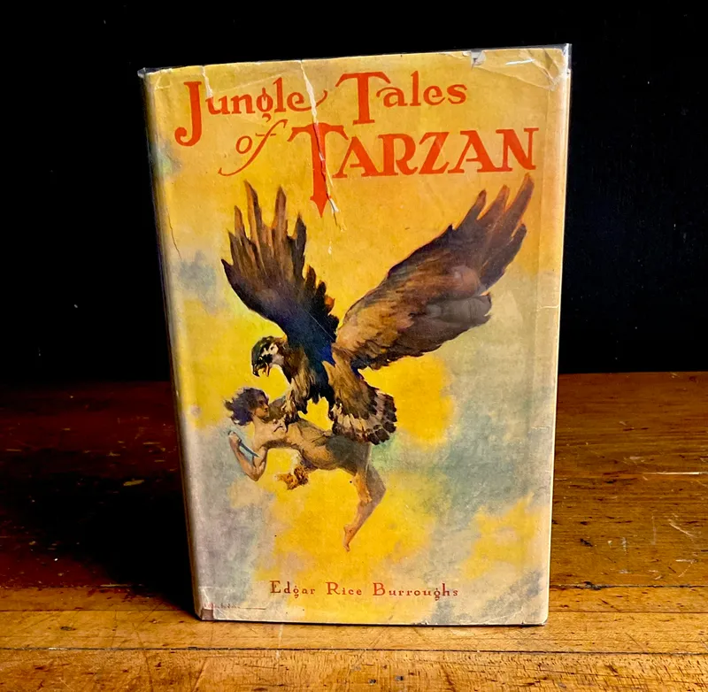1919. Burroughs, Edgar Rice. Jungle Tales of Tarzan. Grosset & Dunlap. Wartime Edition (DJ) from auction in Campbell, New York — image 48
