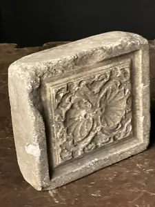 Carved Stone Architectural Relief Fragment with Stylized Floral Motifs