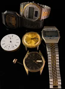 A Group of Vintage Analog and Digital Wristwatches with a Waltham Pocket Watch Movement