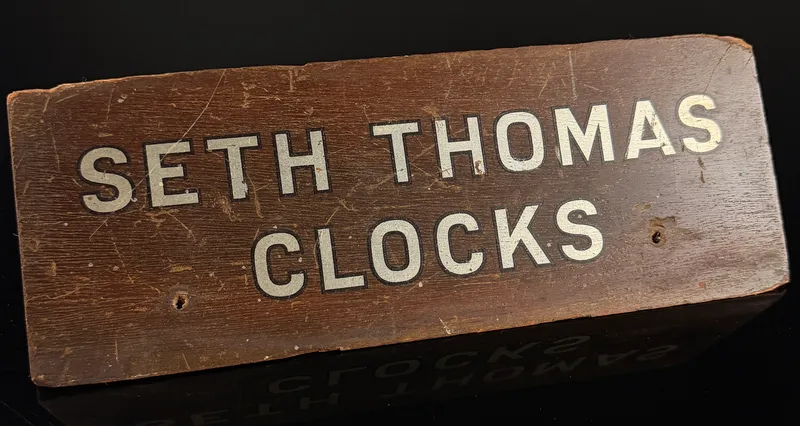 Vintage Seth Thomas Clocks Wooden Advertising Counter Sign from auction in Campbell, New York — image 6