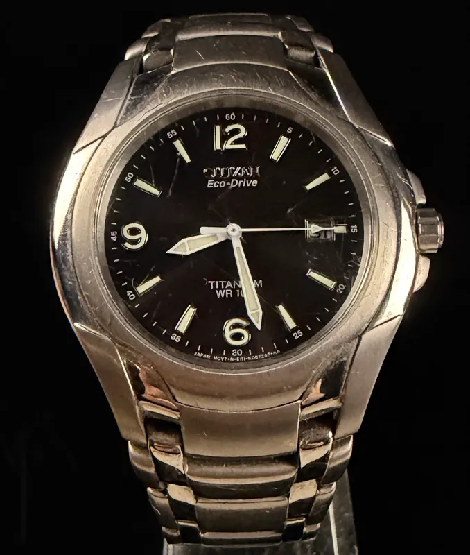 Citizen Eco-Drive Titanium WR 100 Men's Watch Reference E111-K006368 from auction in Campbell, New York — image 13