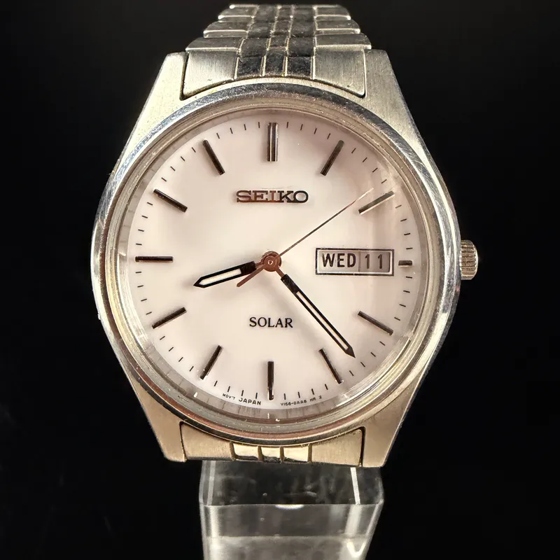 Seiko Solar Day-Date Stainless Steel Men's Wristwatch SNE031 V158-0AS0 from auction in Campbell, New York — image 37